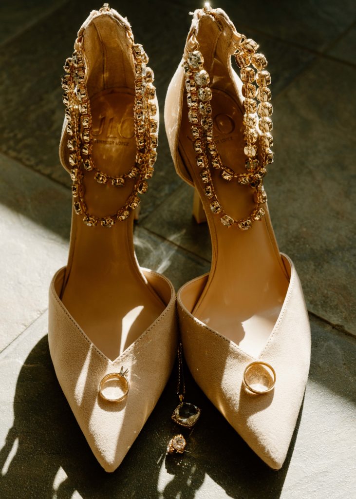 wedding heels with rings, necklace, and earrings, nebraska wedding details