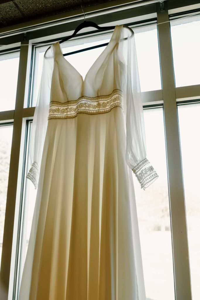 White long-sleeved wedding dress, nebraska catholic wedding