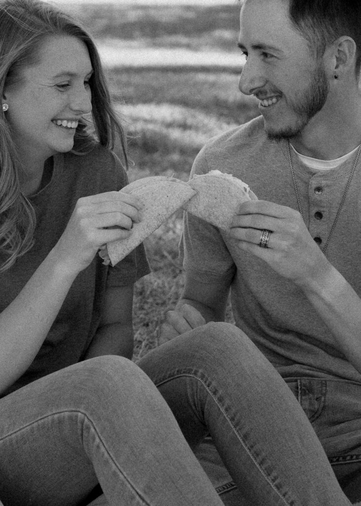 Nebraska Fall Engagement Session at Pioneers Park in Lincoln, Nebraska. Couple eating tacos at their engagement session.
