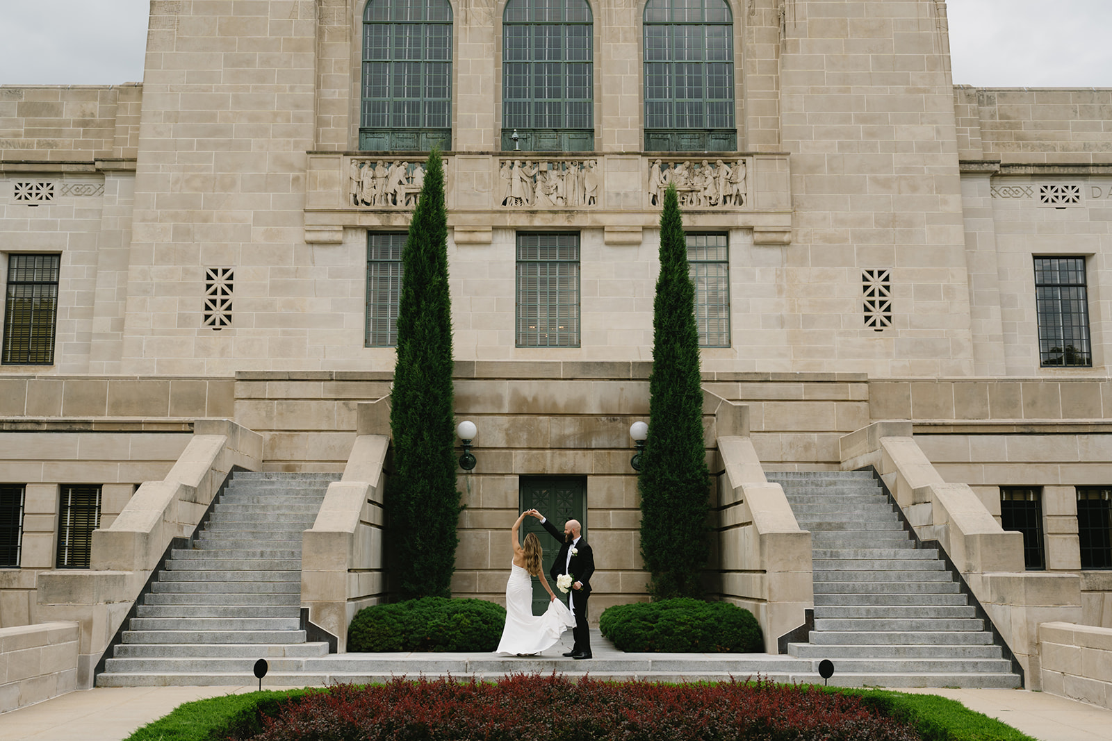 Bride and groom portraits at the Nebraska State Capitol building in Lincoln, Nebraska — Nebraska elopement photographer Britt McNeil